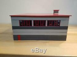1/64 scale Modern Four Bay Fire Station Drive Through Bays. Unpainted Kit