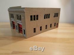1/64 scale fire station. Building Kit. Fits Code 3's. Includes rear bay doors