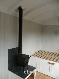 3Kw woodburning stove and flue kit ideal for small spaces, shepherd hut, camper