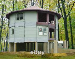 Crawford 32' 2-story Round Customizable Shell Kit Home, delivered ready to build